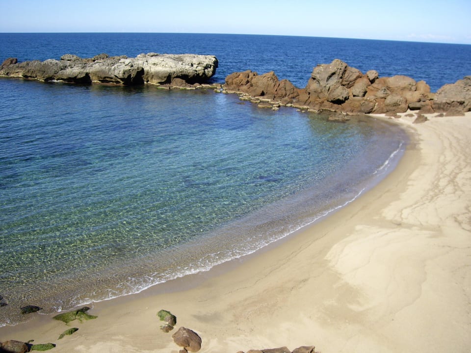 Schöner Sandstrand Grande Baia Resort & Spa