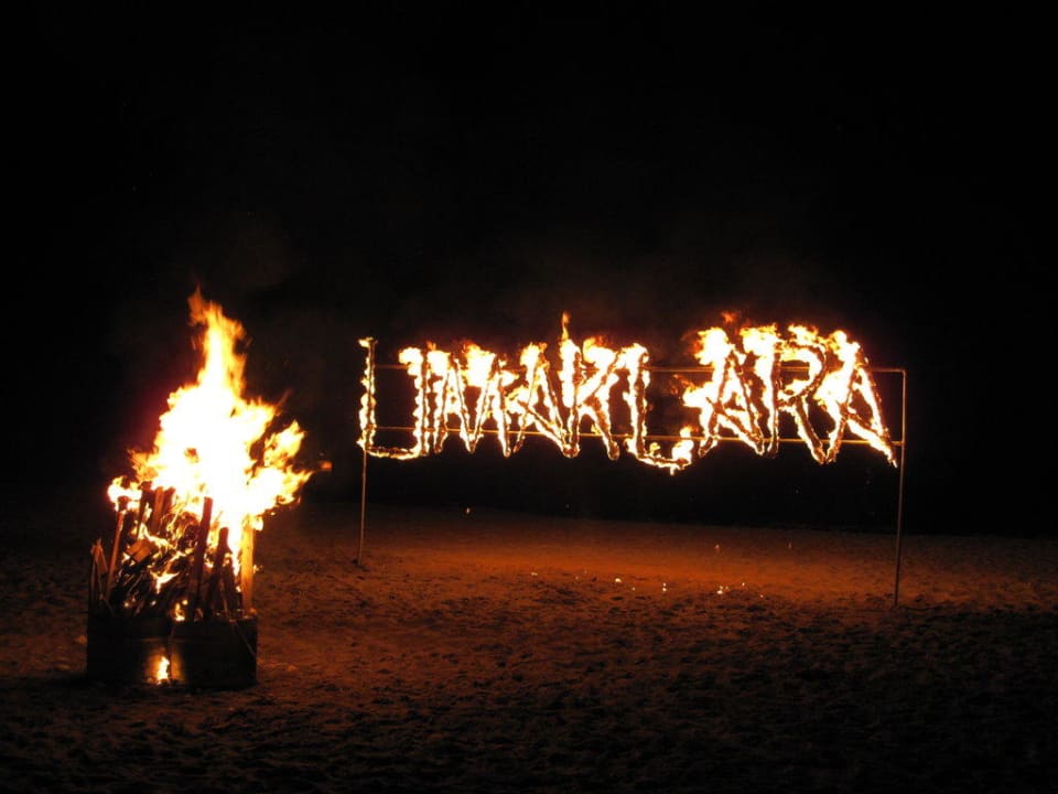 Beach party with Limak Lara written in fire Limak Lara Deluxe Hotel & Resort