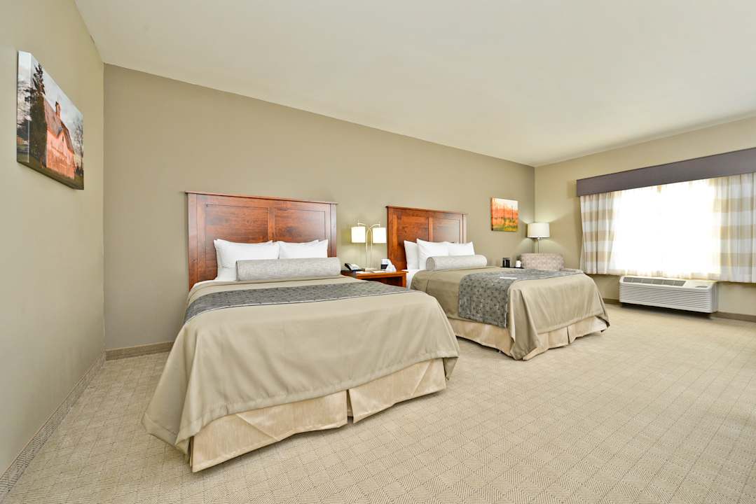 Zimmer Best Western Plus Green Mill Village Hotel & Suites