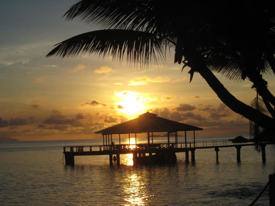 Typischer Sonnenuntergang The Coco de Mer Hotel & Black Parrot Suites