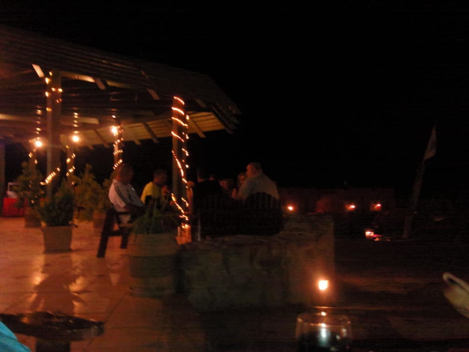 Poolbar bei Nacht Hotel Hauza Beach Resort