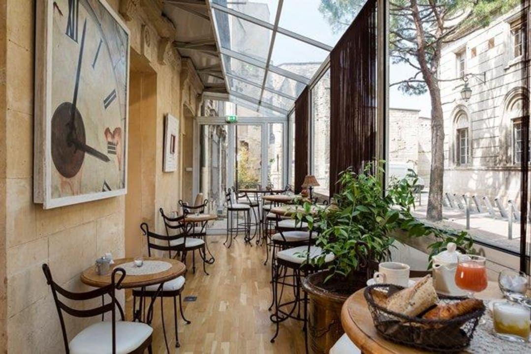 Véranda pour le petit déjeuner Hotel de l'Horloge
