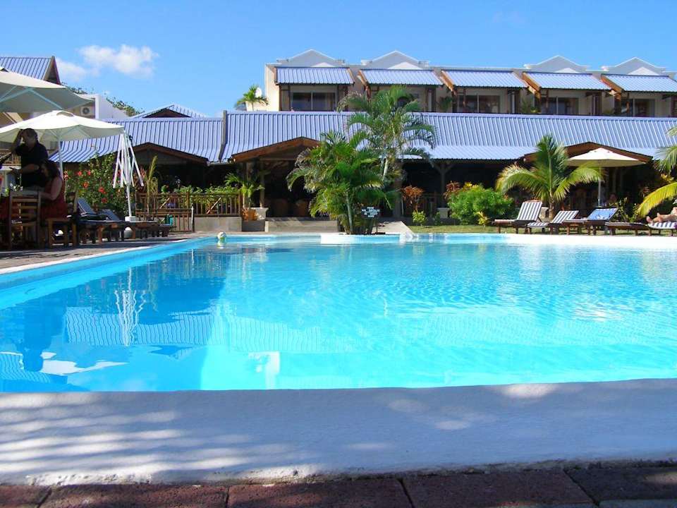 Am Pool Le Peninsula Bay Beach Resort & Spa