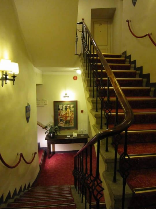 Staircase to the rooms Schlössle Hotel