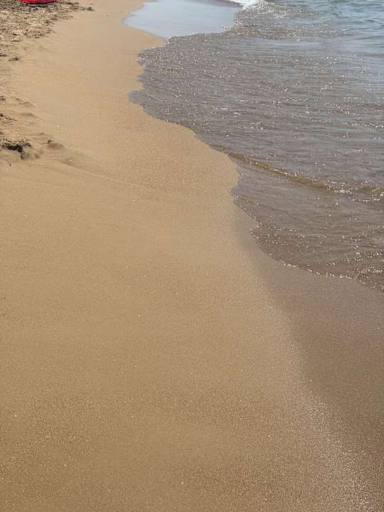 Strand Club Grand Side