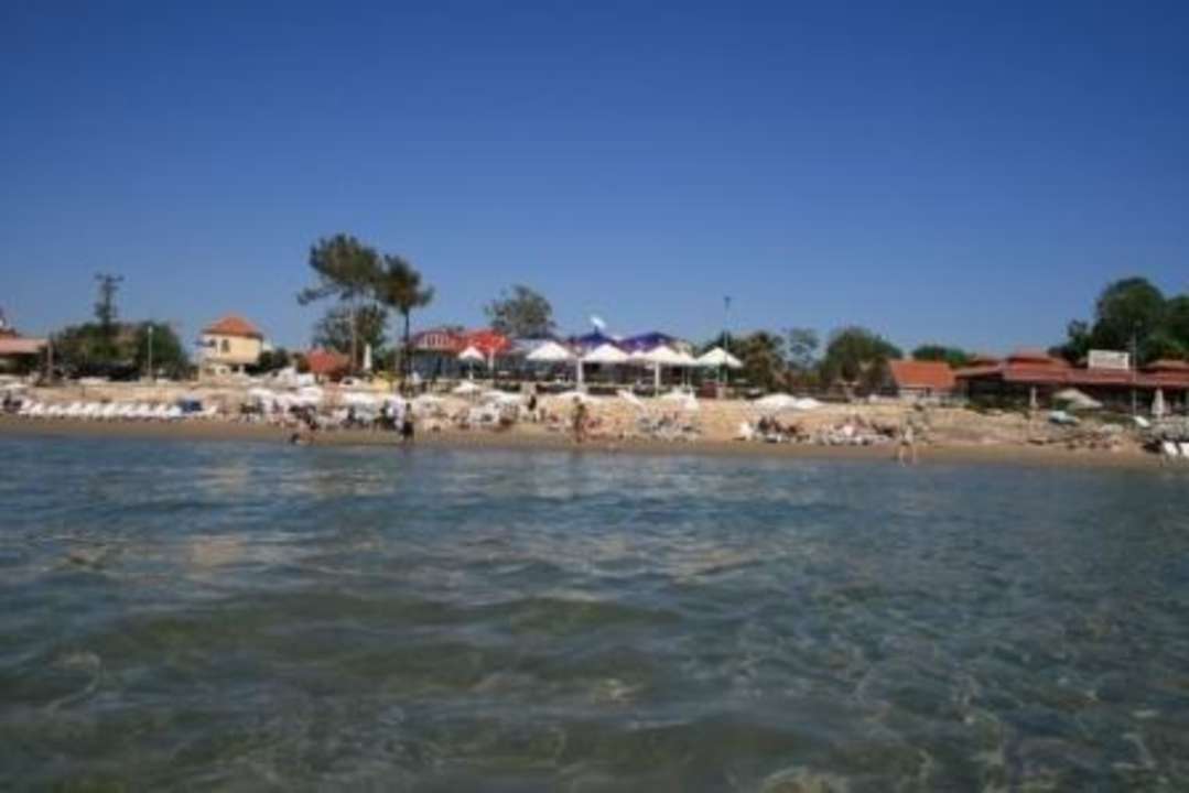 Meer schön flach und klar Clover Magic Nova Beach