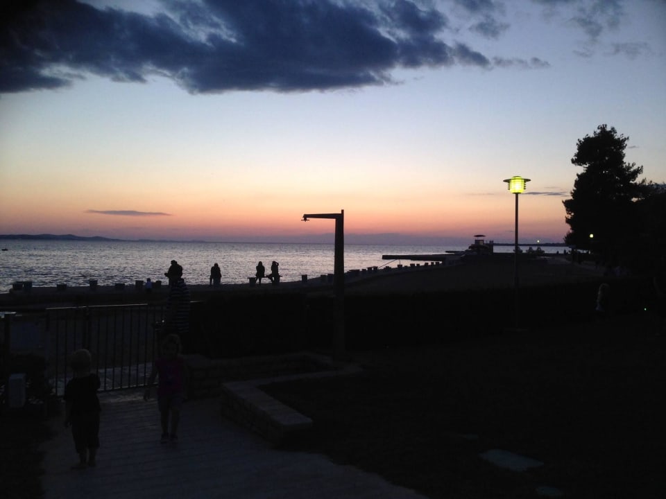 Sunset from the hotel garden across to the beach.  Falkensteiner Club Funimation Borik