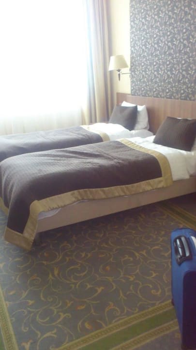 Łóżka w pokoju dwuosobowym Leonardo Royal Hotel Warsaw