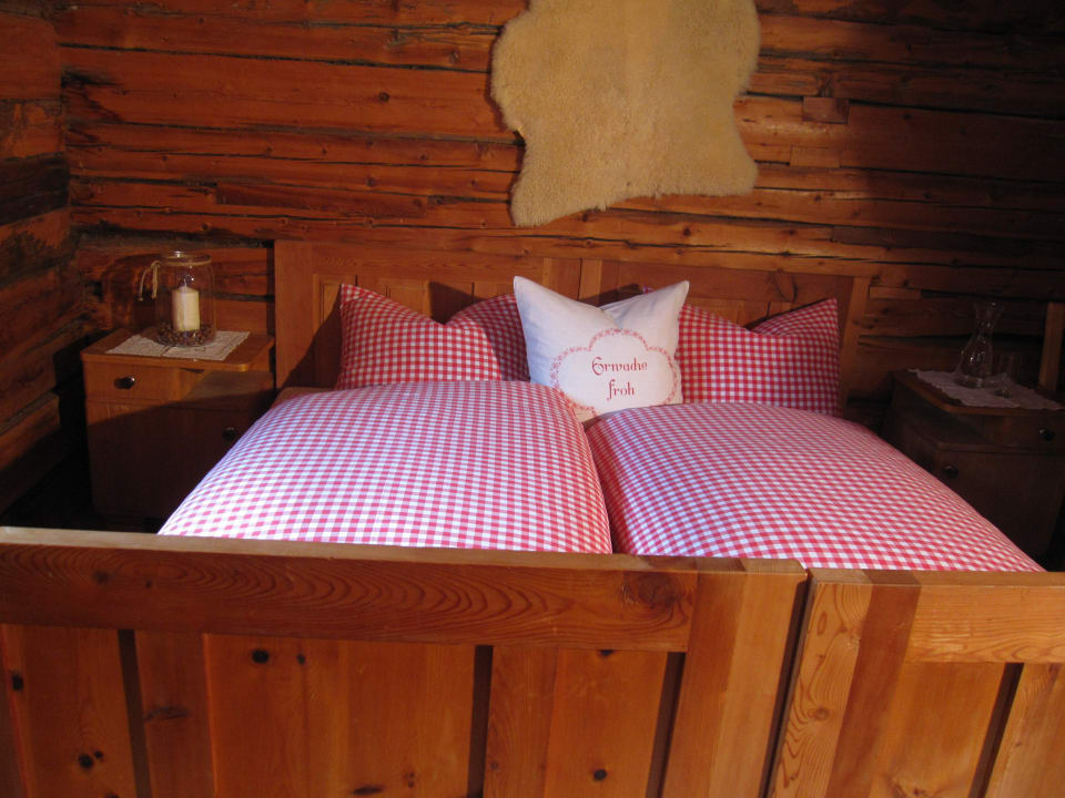 Eines der gemütlichen Schlafzimmer Alfenalm Hütte Mittergutnigg