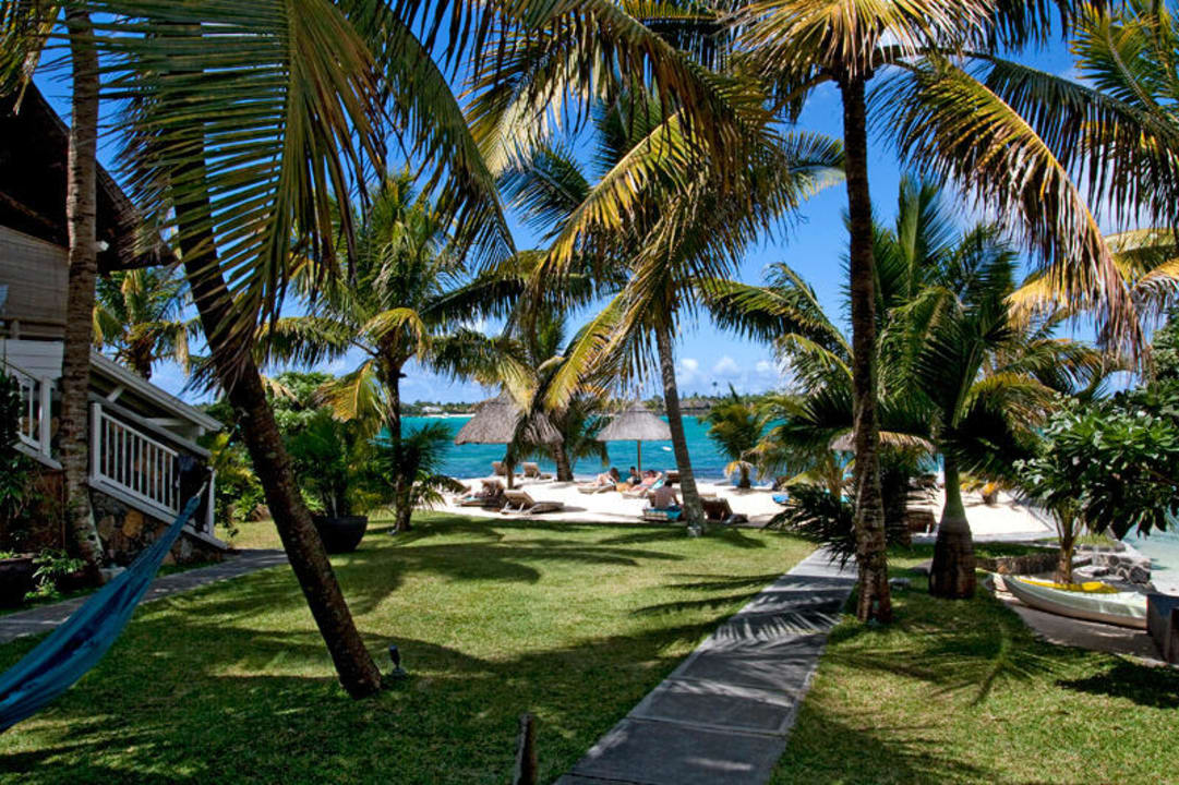Blick auf einen Teil des Hotelstrandabschnitts La Maison 20 Degrés Sud - Relais & Châteaux
