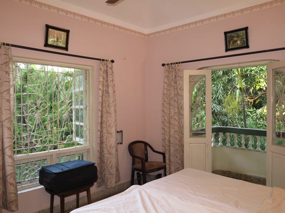 Zimmer mit Blick in die Palmen Hotel Palm Grove Cottages