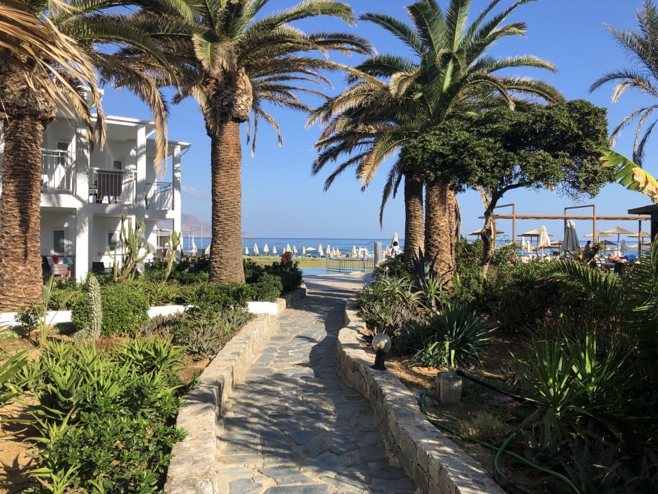 Gartenanlage HARPIN Happy Days Beach Hotel