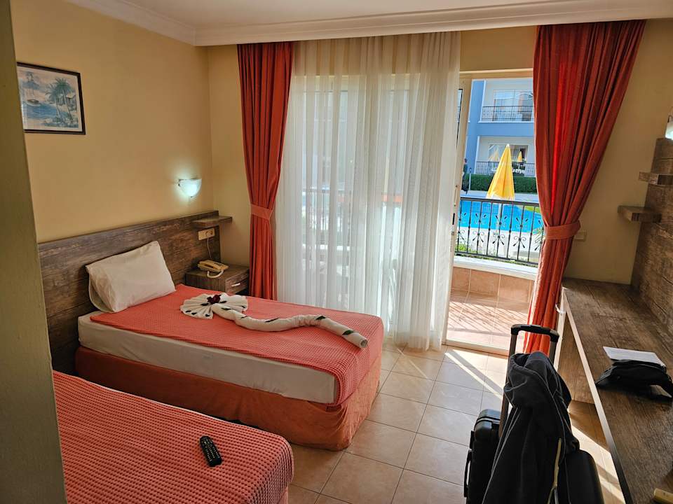 Zimmer Sayanora Hotel