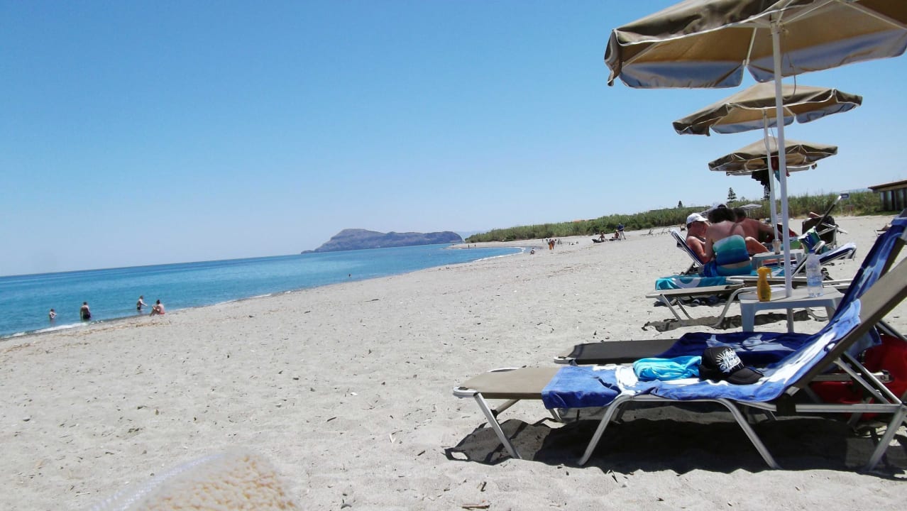 Liegen am Strand Caretta Beach Hotel