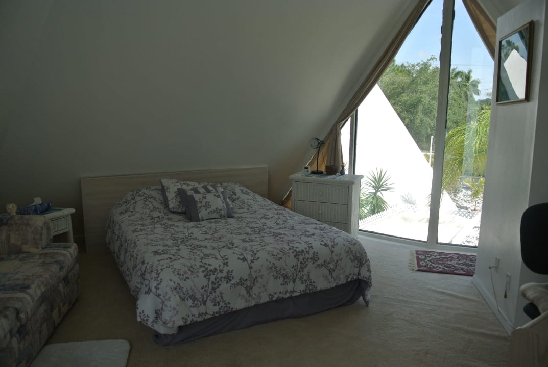 Schlafzimmer Obergeschoss Pyramids in Florida
