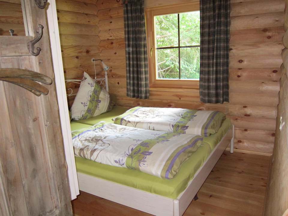 Schlafzimmer mit Doppelbett Montara Suites Bodenmais