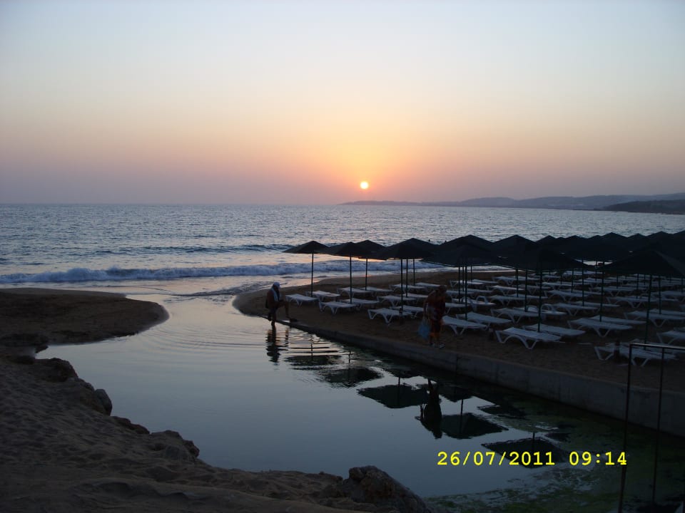 Západ slnka pri pláži My Home Resort