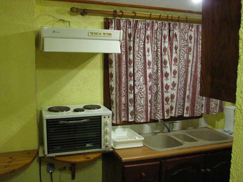 The kitchen of a double room apartment Apartments Sunrise