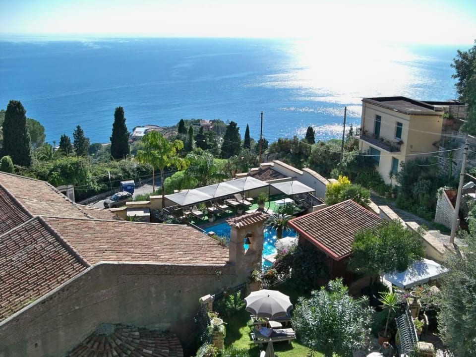 View of swimming pool and garden from my room Hotel Villa Carlotta