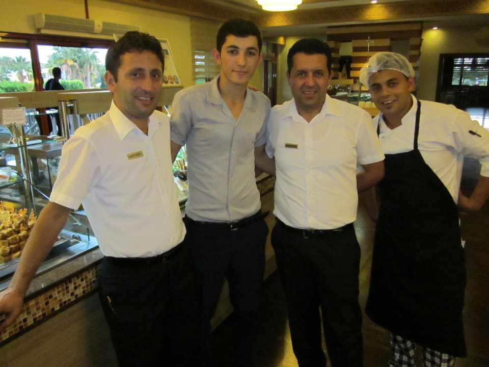 Vier Herren vom Restaurant Club Grand Side