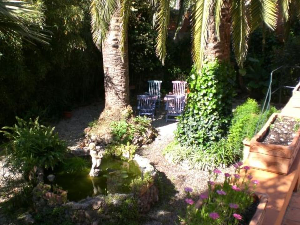 Ruhezone im Garten S'Hostal D´Esporles