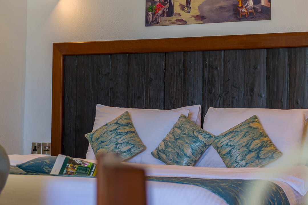 Zimmer Travellers Beach Hotel & Club