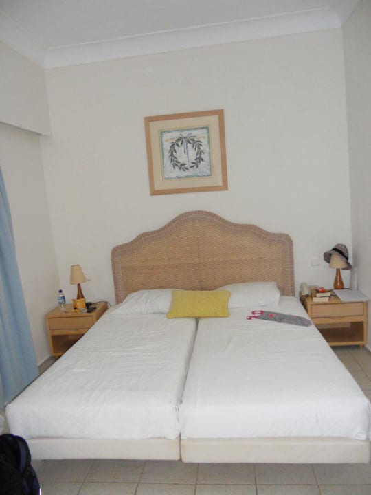 Das Bett im Bungalow Grecotel LUXME Dama Dama