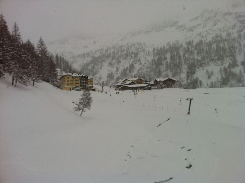 Blick vom Sessellift auf das Hotel Hotel Almschlössl / Schrotteralm