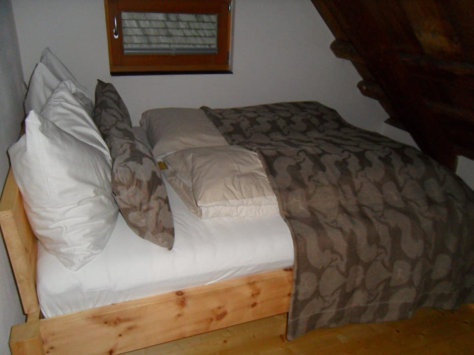 Eins der Schlafzimmer LUXGUT - OLIVIA