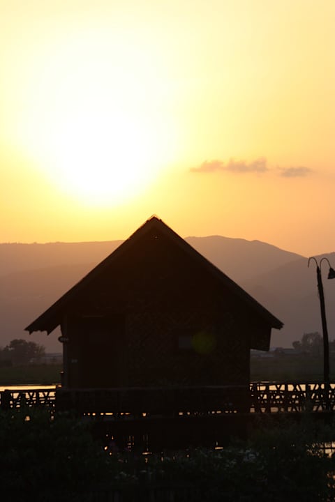 Beim Sonnenuntergang Hotel Golden Island Cottages 1 & 2