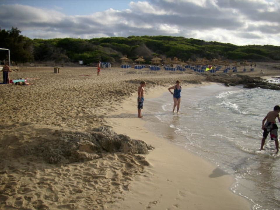 Strand bei Sonnenuntergang Hotel & Spa S'Entrador Playa