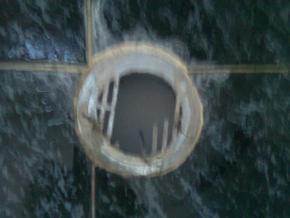 Drain on bathroom floor Nest Apartments