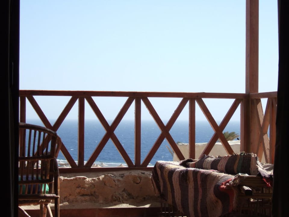 Ausblick vom Bett aus. The Oasis Dive Resort