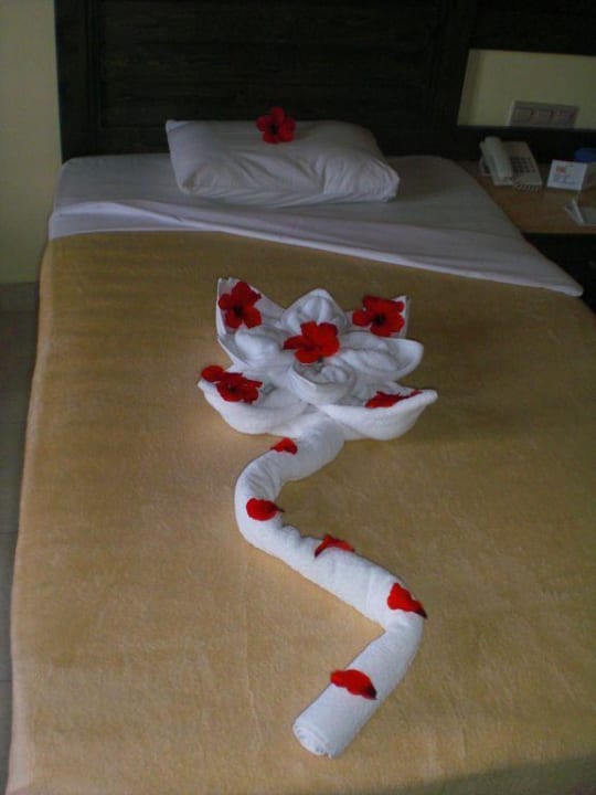 Bettdeko. Hotel Carnelia Beach Resort