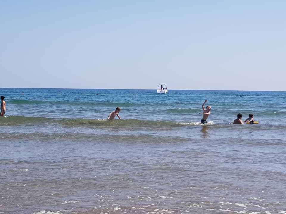 Strand Club Grand Side