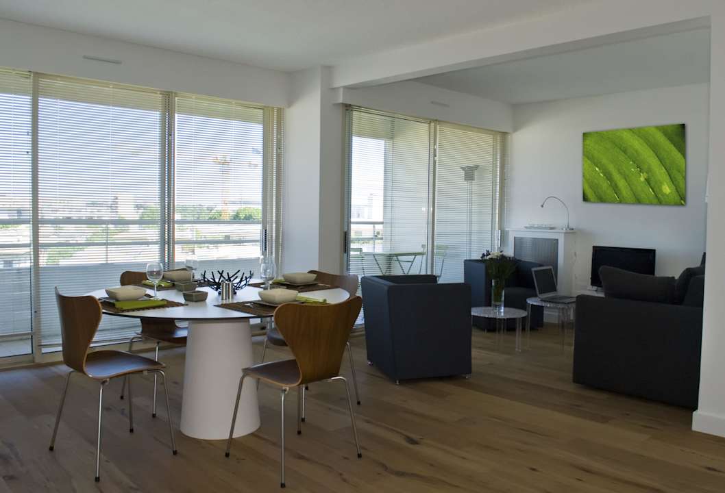 Le salon et son coin repas Apartment Homestay Le Maestro