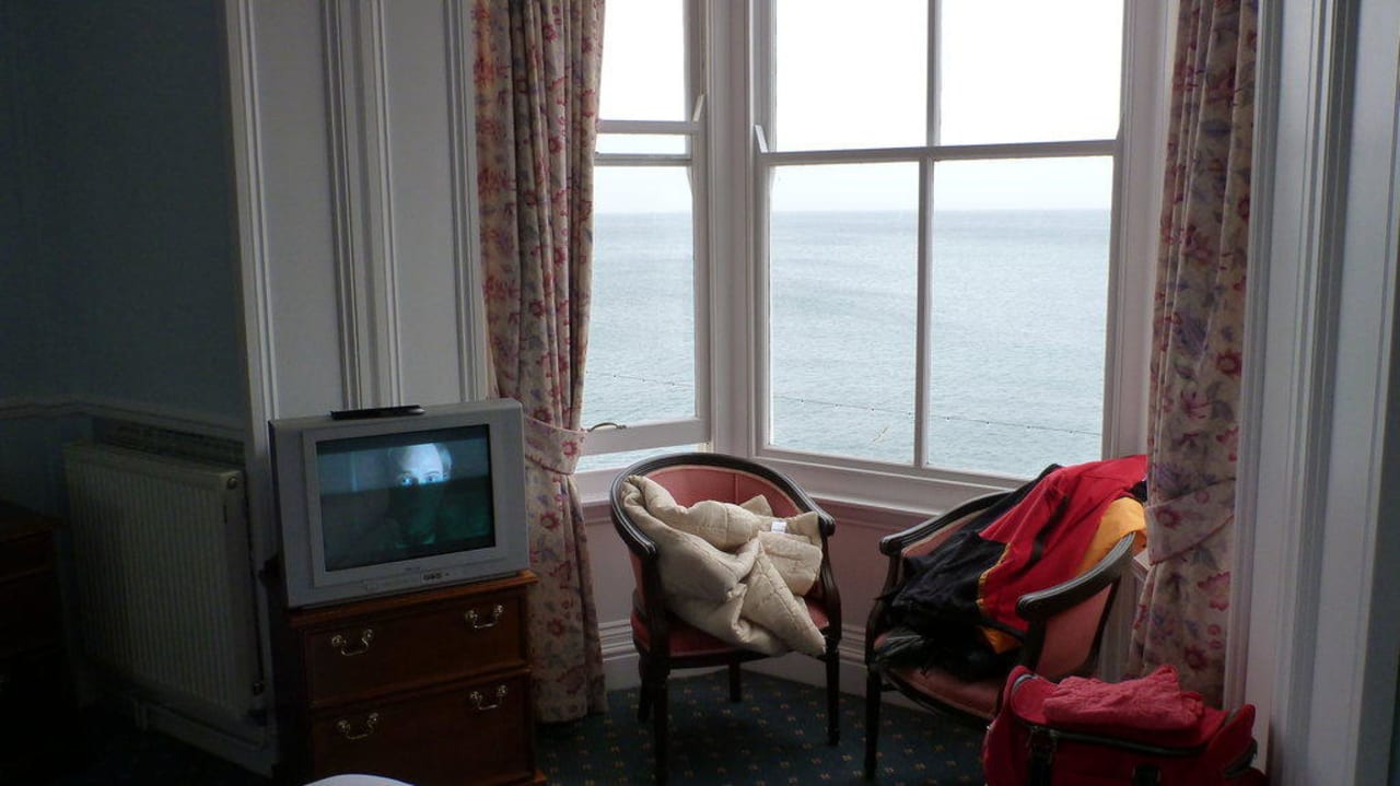 Fernseh- und Sitzecke Hotel Queens