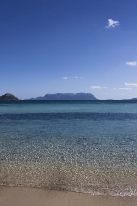 Strand direkt vorm Hotel Hotel Resort & Spa Baia Caddinas