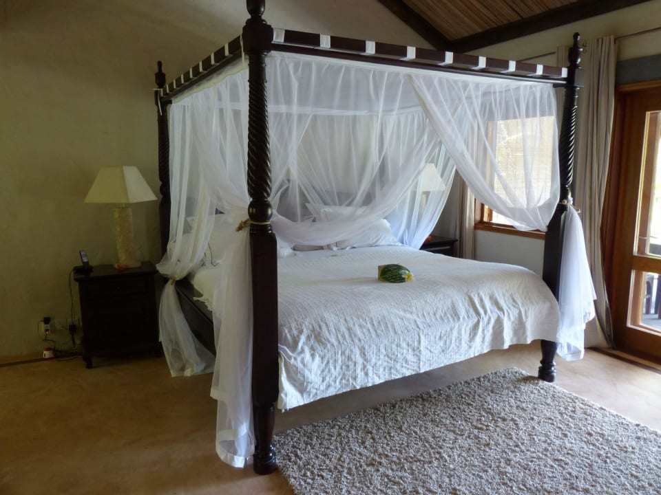 Bett mit Moskitonetz Lakaz Chamarel Exclusive Lodge