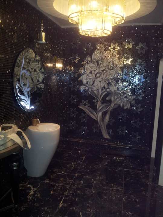 Toilet in lobby Q Premium Resort