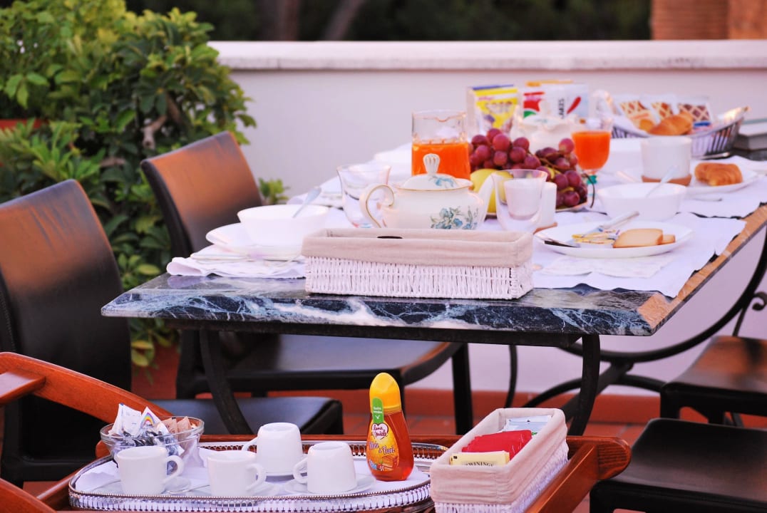Colazione sulla terrazza- Breakfast on the terrace Attico 203
