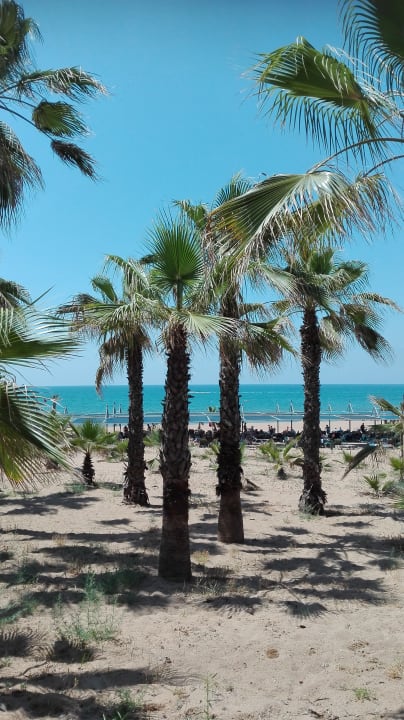 Strand Club Grand Side