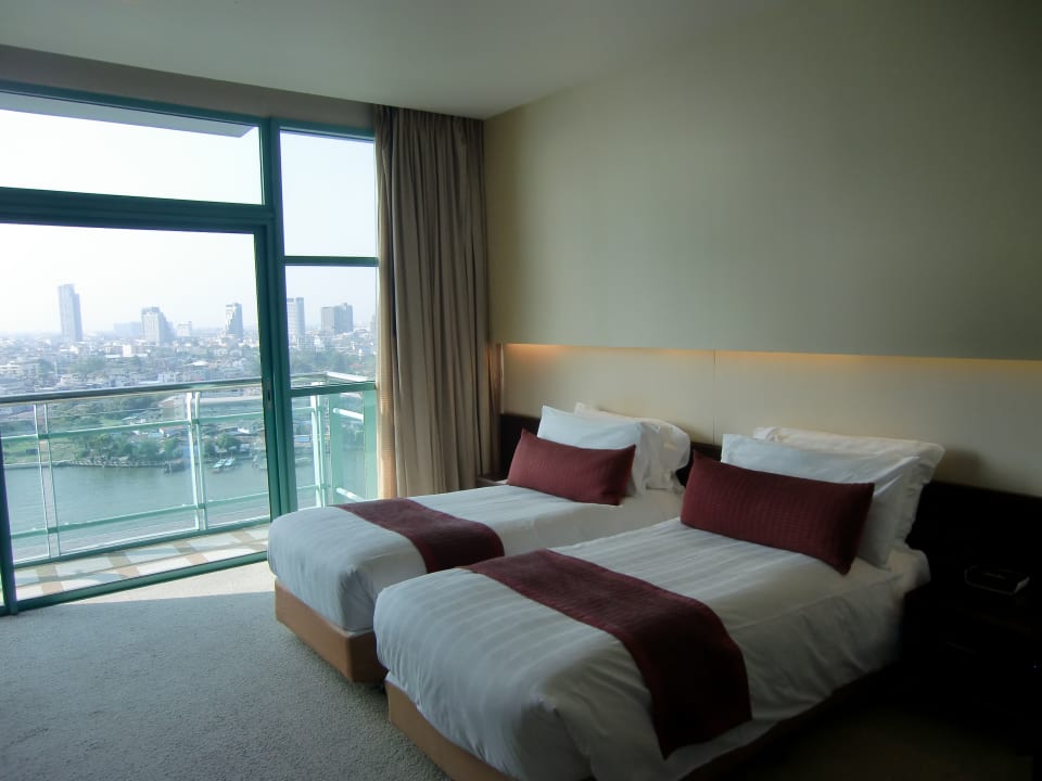 Die Betten können hier auch zusammen geschoben werden Chatrium Hotel Riverside Bangkok