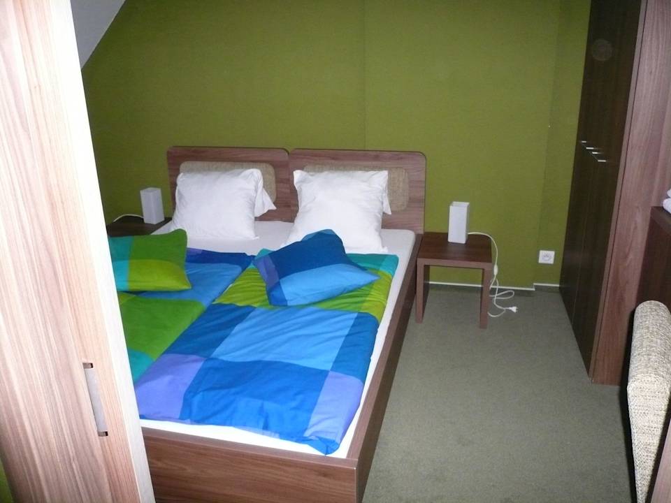 Schlafzimmer Apartments Dom TatraTravel Smokovec