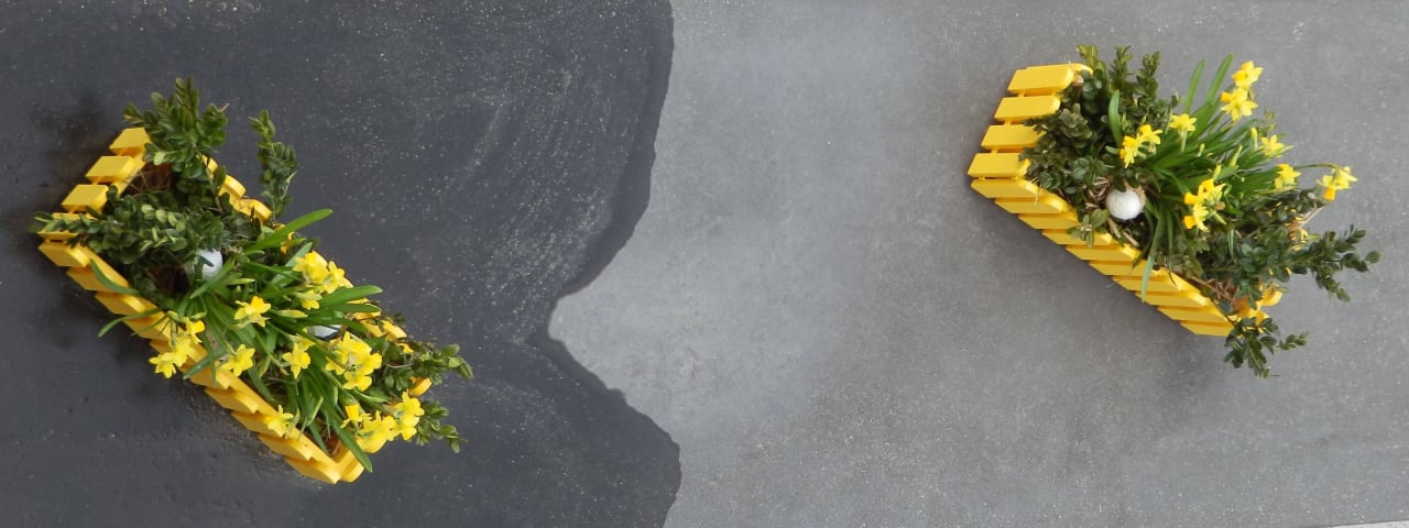 Blumendeko vor dem Eingang Hotel Traube am See