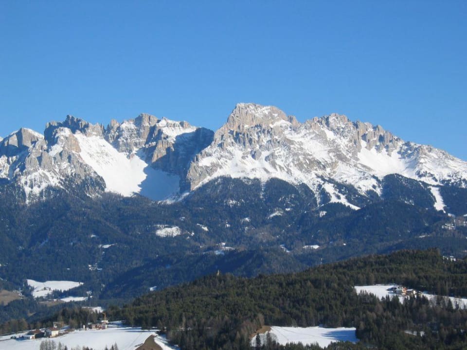 Latemar im Winter Panoramahotel Obkircher