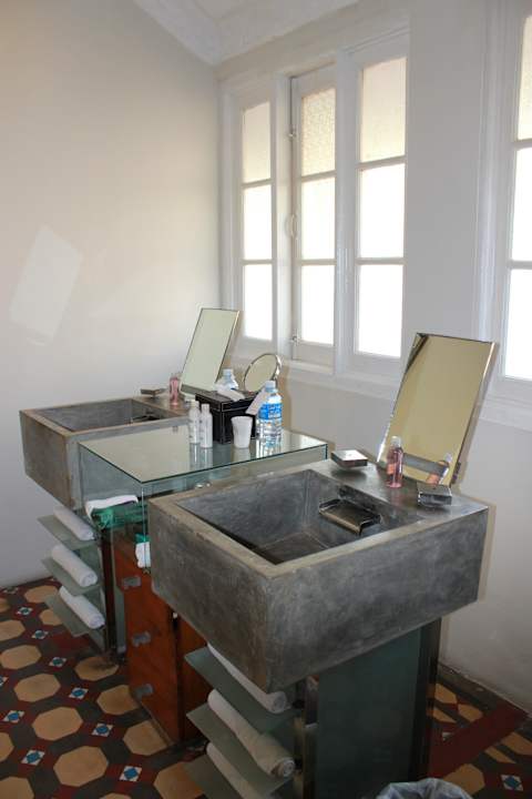 Bad mit Wasserfallwaschbecken Hotel Casa Colombo