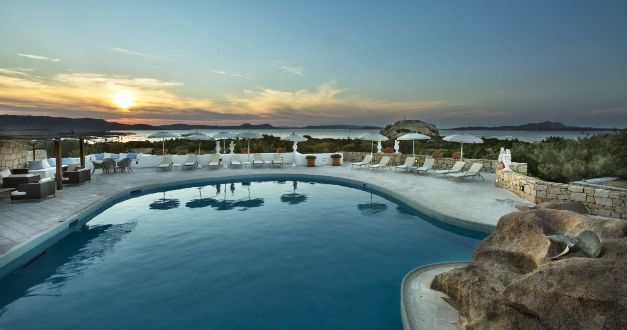 Sunset on the swimming pool Hotel Grand Relais dei Nuraghi