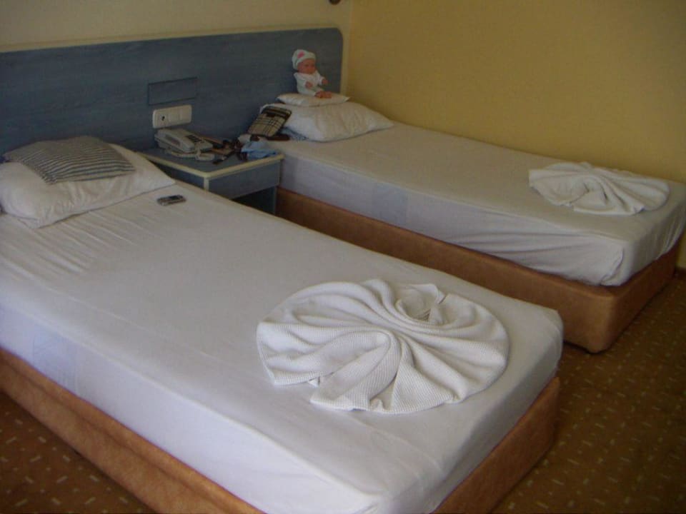 Betten im Zimmer Hotel Grand Okan