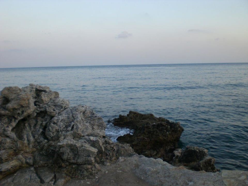 Strand Sonnenuntergang Hotel Kalithea Mare Palace